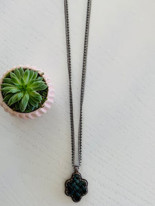 Long Hematite Necklace With Vintage Tibetan Charm